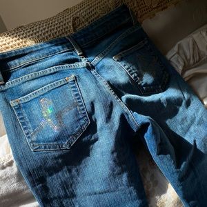 Bebe embellished low rise flared denim